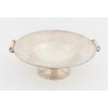 Hammered silver circular pedestal dish, with foliate and ivory handles, the foot inscribed 'From
