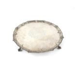 George III silver salver by Richard Rugg with heavily embossed shell and gadrooned border,