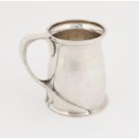 AMMENDED DESCRIPTION - Attributed to a design by Archibald Knox / Oliver Baker, planished silver