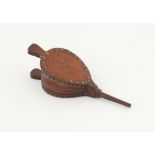 19th century carved wood snuff box in the form of bellows with brass tack decoration, 11cm long,