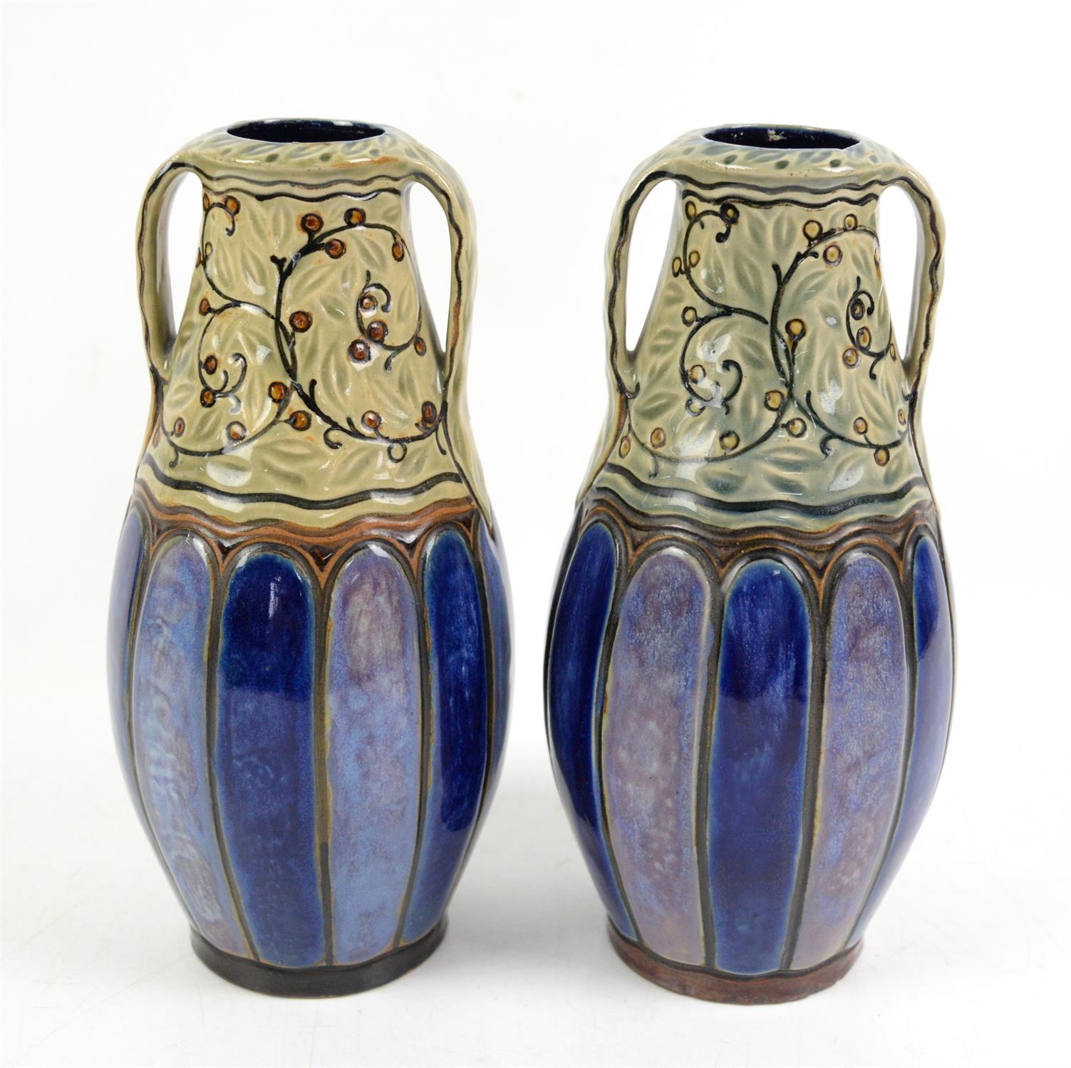 Pair of Doulton Lambeth twin handle vases