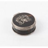 Silver and tortoiseshell circular dressing table box, inset with floral ribbon design, 6.