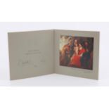 H.M Queen Elizabeth II and H.R.H Prince Philip. Christmas greetings card from 1961 signed by both