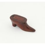 18th/19th century carved wood shoe form snuff box, with pique work decoration, 9cm long,