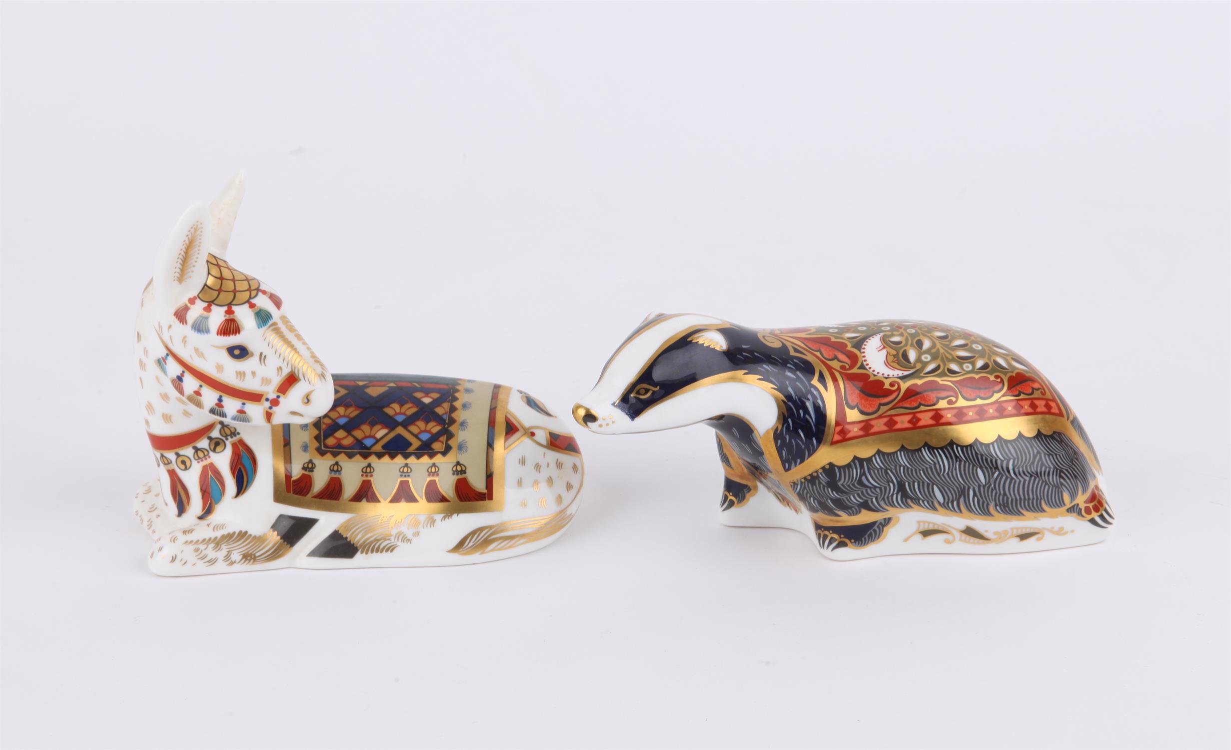 Two Royal Crown Derby paperweights, Badger and donkey in original boxes PROVENANCE; A collection of