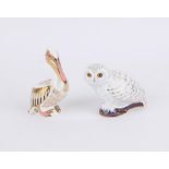 Two Royal Crown Derby paperweights. snowy owl and white pelican in original boxes PROVENANCE; A