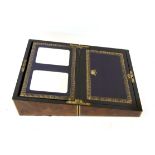 Mid 19th century burr walnut and brass bound writing box, of rectangular form, enclosing a leather