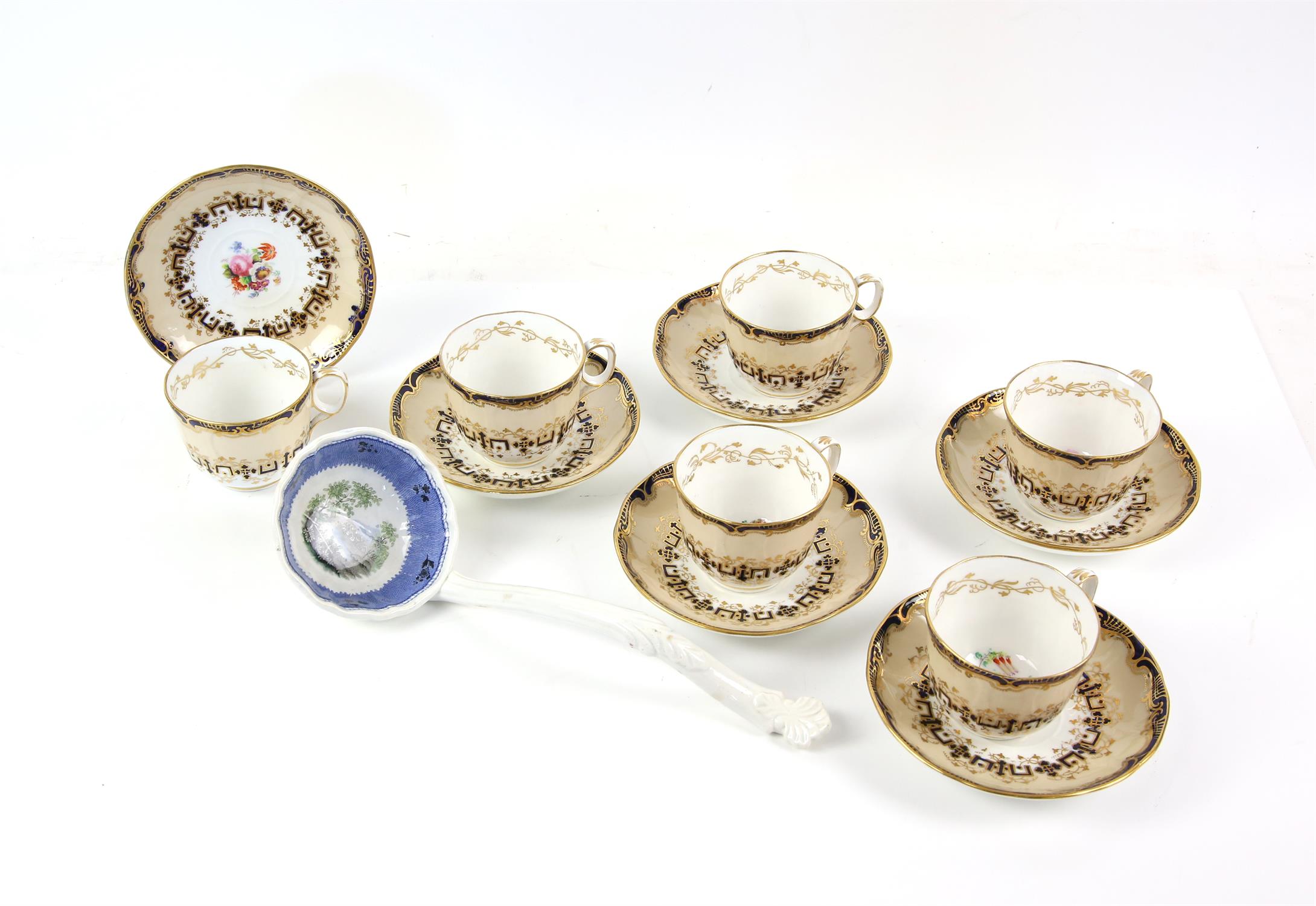 Set of Six Davenport tea cups and saucers, in underglaze blue with mocha band and gilt foliate