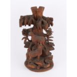 late 19th/early 20th century Black Forest carving with two chamois in an exotic garden.