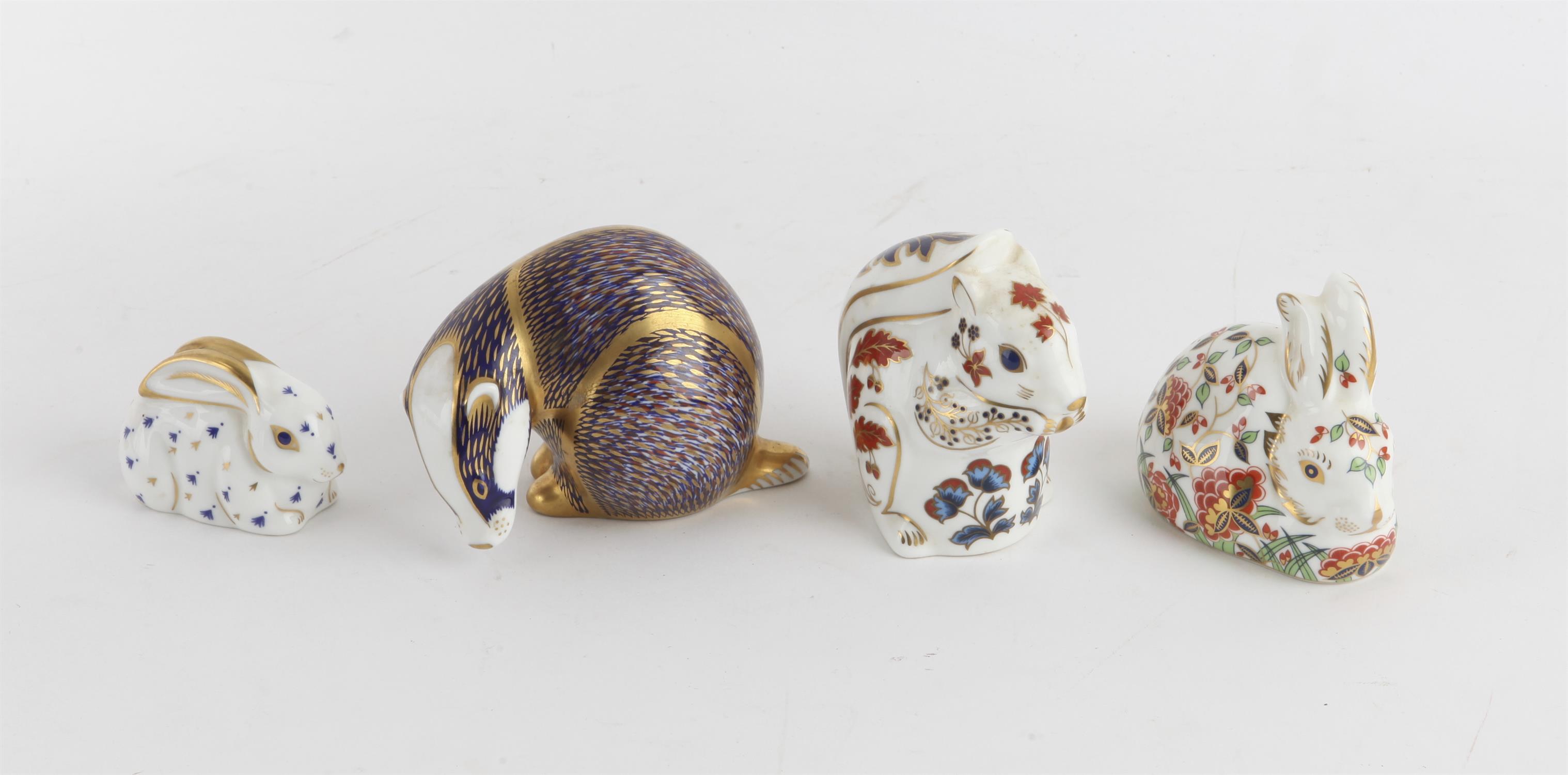 Four Royal Crown Derby paperweights, badger, squirrel, and 2 x rabbits PROVENANCE; A collection of