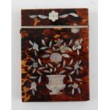 19th century tortoiseshell and mother of pearl card case decorated with an urn and flowers.
