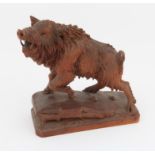 Late 19th/early 20th century Black Forest carved wild boar, 19cms wide 20cms high PROVENANCE; A