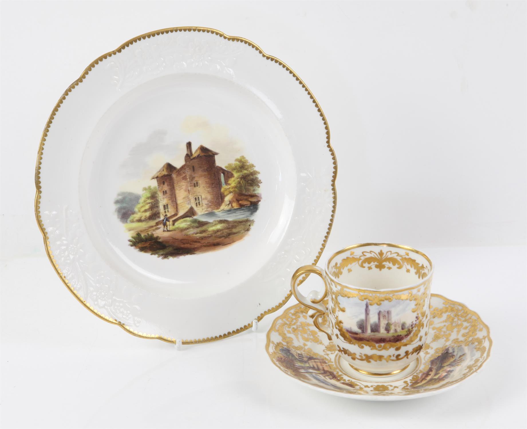 Spode tea cup and saucer, with foliate gilding and relief cartouches, the cup painted with 'Round
