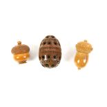 19th century coquilla nut pomander, in the form of an egg, 6.5 cm high, and two treen cotton reel