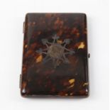 Tortoiseshell card case, of hinged rectangular form, with silver inset design, 11 x 8 cm