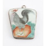 Chinese porcelain pendant, formed from a vase fragment, depicting a cockerel, in a white metal