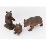 Three various late 19th/early 20th century carved bears the largest 24 cms PROVENANCE; A collection