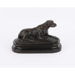 Bronze figure of a seated Labrador, on a moulded base, 16 cm high, 27.5 cm wide