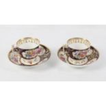 Pair of Spode cabinet cups and saucers, with underglaze blue and foliate gilt grounds,