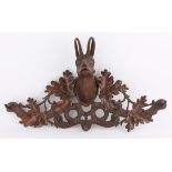 Late 19th/early 20th century Black Forest carved wall mounted coat hooks, carved with chamois head