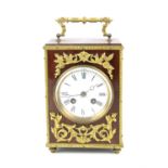 French mahogany and brass mounted clock, twin train movement, white enamelled dial and Roman
