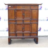 Korean hardwood book chest, with brass straps, the three drawers over two pairs of cupboard doors,