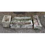 Set of three reconstituted stone rectangular jardiniere with flowerhead designs, 80 x 27 cm and a