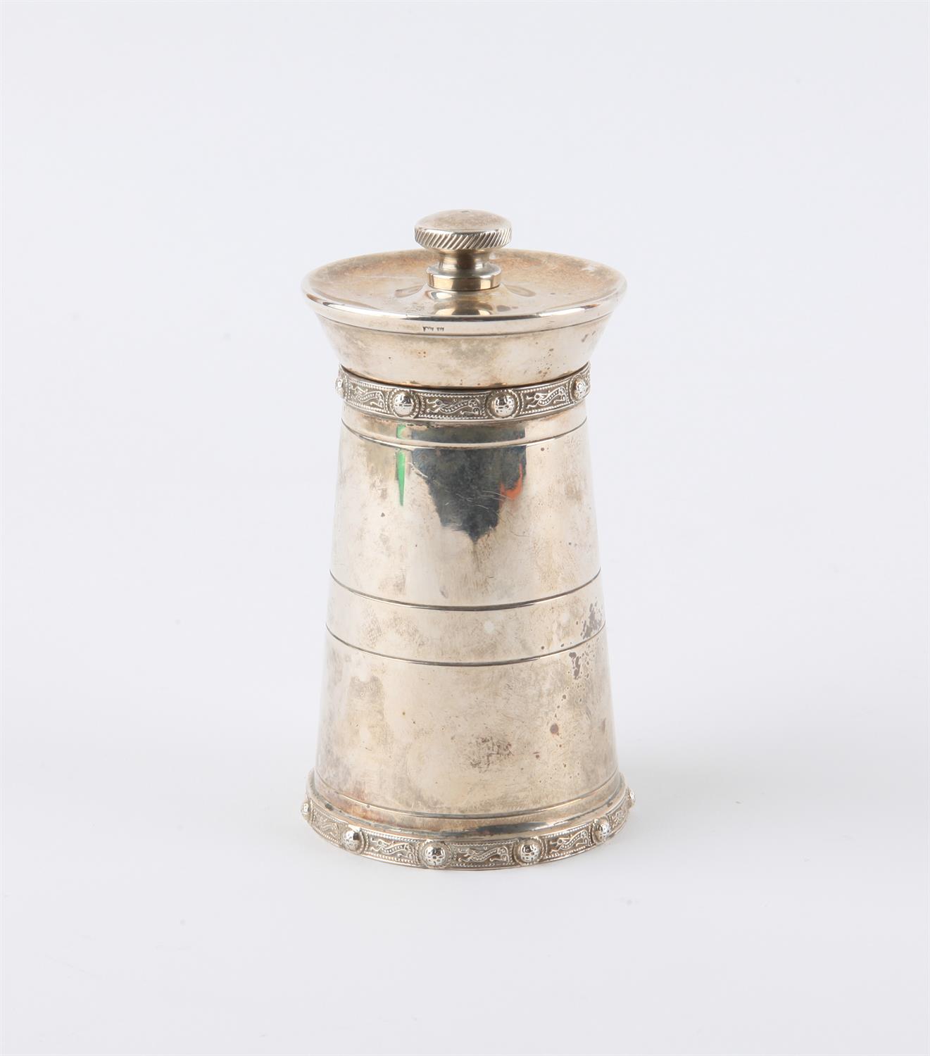 Silver pepper grinder, of tower form with Celtic bands, Mappin & Webb, Birmingham 1970, 9 cm high