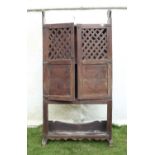 18th century stained pine food cupboard, the lattice and panelled pair of cupboard doors,