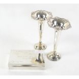 Pair of silver tapering spill vases and a silver cigarette box, Birmingham 1911, Elkington & Co, 17.