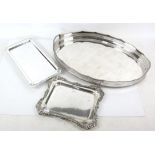 Silver plated oval tray, 61 cm wide, an oak canteen of 12 fish knives and forks, a pair of