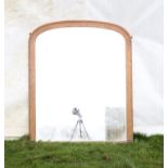 Victorian pine framed overmantel mirror, the arched plate within a moulded frame, 134 x 112 cm