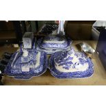 Three blue and white dishes and covers, other blue and white china and a silver plated sauce boat,