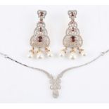 Necklace set with white cz stones in an ornate design, mounted in tested silver, together with a