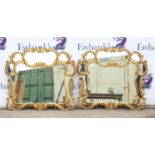 Pair of giltwood wall mirrors, of scrolling shaped form with mirrored borders, 64 x 74 cm (2)