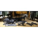 Victorian cast iron door stops, including a passing lion, 25 cm wide, horses and dogs (9)