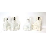 Large pair of Victorian Staffordshire spaniels with glass eyes, H28cm together with another smaller