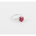 Ruby ring, round cut ruby weighting an estimated 3.66 carats, six claw set in 9 ct white gold,