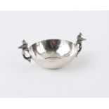 Two handled silver cup decorated with a bird to each handle