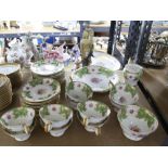 Royal Worcester gilt and green coffee set of 12 coffee cans and saucers with jewelled borders,