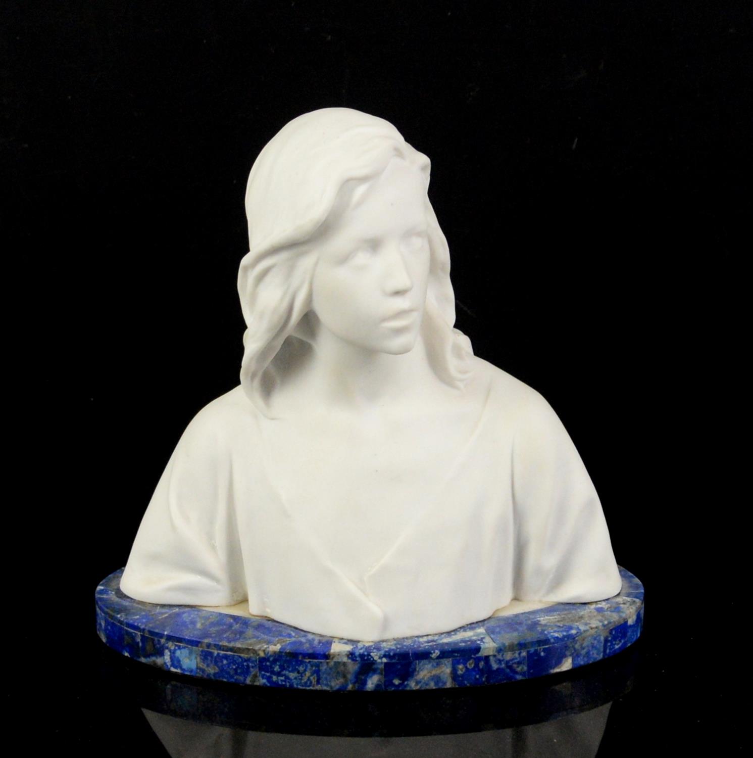 Early 20th century Sevres bisque porcelain bust of a young girl, impressed mark and initials LS,