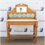 Victorian pine washstand, the mirrored and tiled back over a marble top and turned stretchers