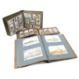 Postcard album and two albums of cigarette cards, featuring Will's Cigarettes and Player's