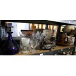 Glassware to include a blue glass flask, drinking glasses, table lustre and other items,