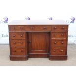 Victorian mahogany kneehole desk, the rectangular top with three frieze drawers over a panelled