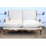 Three piece French style walnut lounge suite, the scroll carved frame with shell motifs on moulded