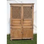 18th century pine food cupboard, the lattice and panelled doors over a another pair of panelled