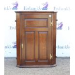 19th century oak hanging corner cupboard, with panelled door, H102 W78 D43.5 cm