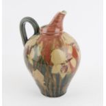 Desmond Clover studio pottery jug, with Iris decoration, 27cm high,