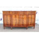 A Regency style mahogany and satinwood crossbanded breakfront side cabinet, by William Tillman,